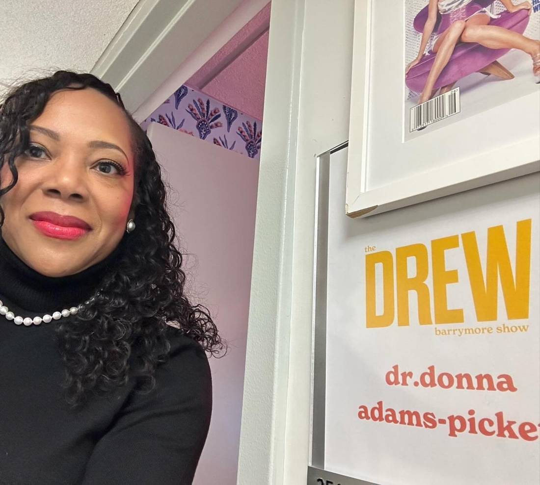 Dr. Donna Adams-Pickett beside her dressing room sign at The Drew Barrymore Show